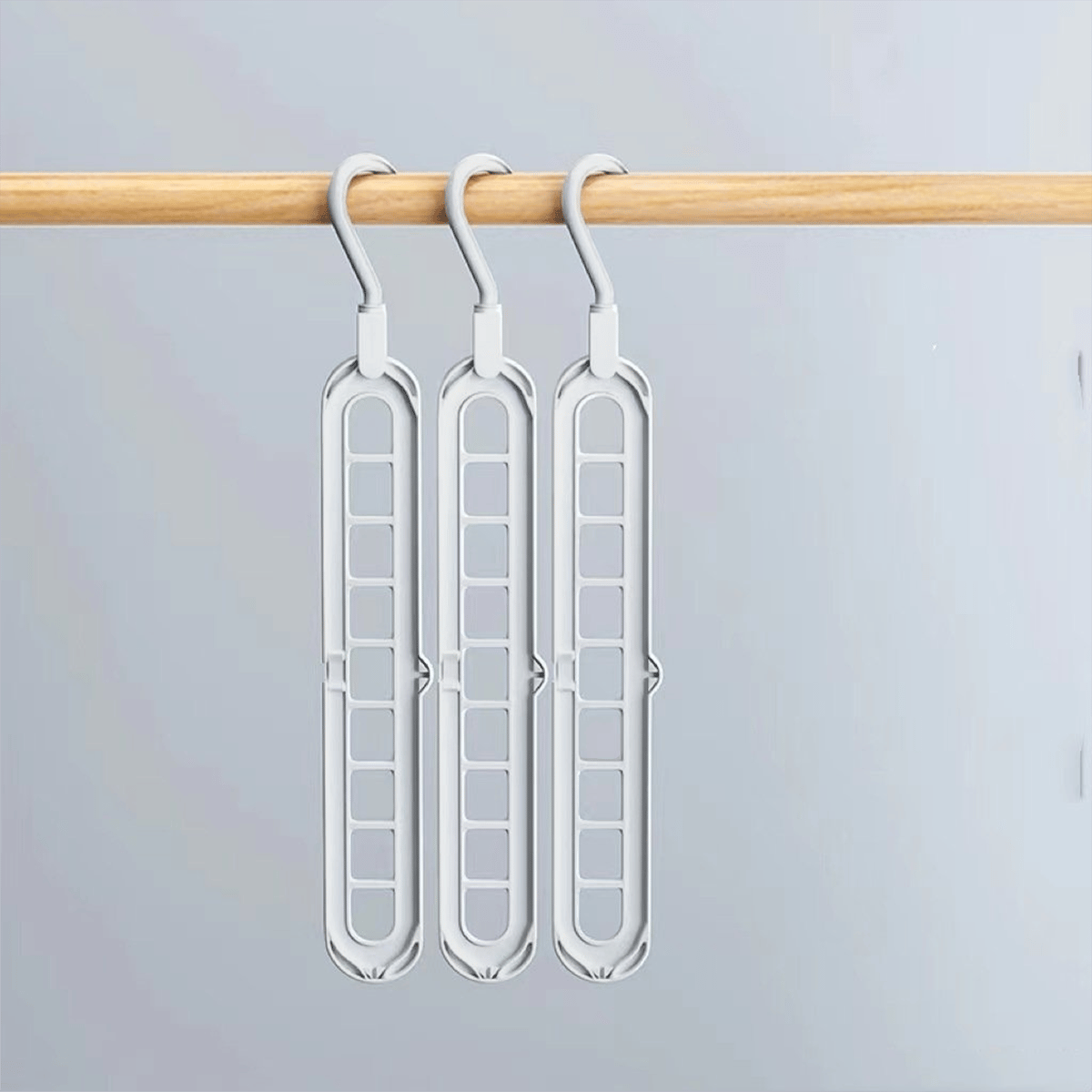 🔥👚 Multifunctional clothes drying rack with a nine-hole design—freeing up to 85% of your wardrobe space!