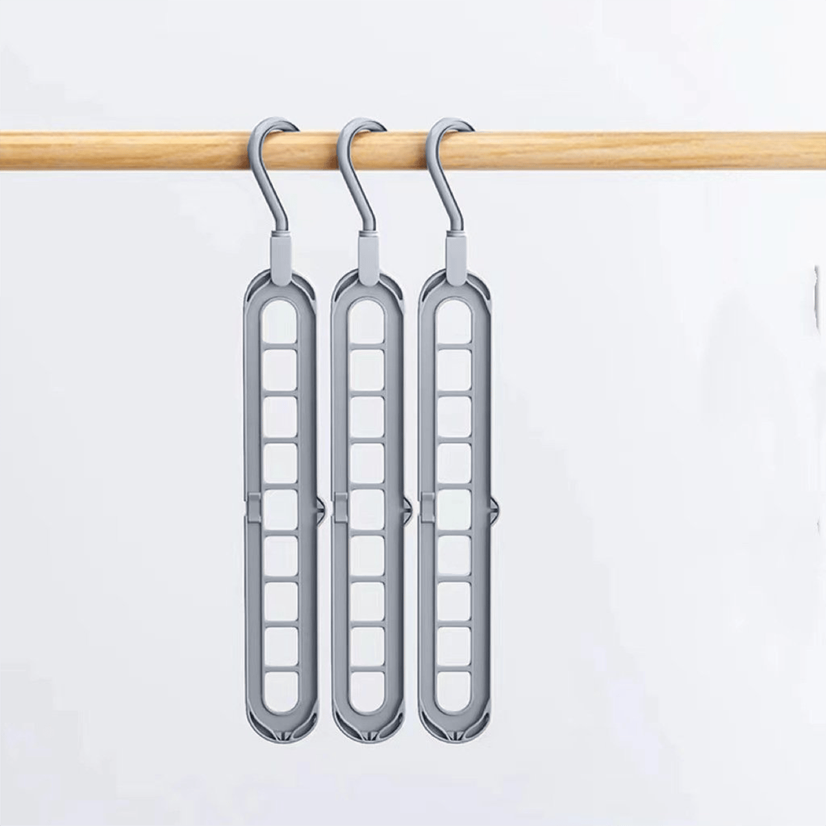 🔥👚 Multifunctional clothes drying rack with a nine-hole design—freeing up to 85% of your wardrobe space!